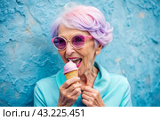 Portrait of an extraordinary, stylish, fashionable elderly woman, a pensioner of 70 years old, with glasses and ice cream in her hand. The concept of happy seniors and delicious desserts. Стоковое AI-изображение, AI-художник Photojuli / Фотобанк Лори