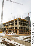 Belarus, Minsk - 07 february, 2024: Modern houses in Minsk world. Редакционное фото, фотограф Аксенова Вера / Фотобанк Лори