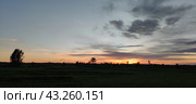 Spring sunset over the field. Стоковое фото, фотограф Andrew_Swarga / Фотобанк Лори