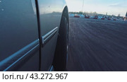 The work of the front wheel of the drift car during the arrival at the site at sunset. Close-up. Стоковое видео, видеограф Ярославский Максим / Фотобанк Лори
