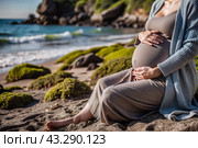 Relaxation, peace of mind, sea air. Close-up of the tummy. A pregnant woman on the beach by the sea. The concept of pregnancy, childbirth and parental responsibilities. Стоковое AI-изображение, AI-художник Photojuli / Фотобанк Лори