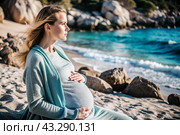Relaxation, peace of mind, sea air. Close-up of the tummy. A pregnant woman on the beach by the sea. The concept of pregnancy, childbirth and parental responsibilities. Стоковое AI-изображение, AI-художник Photojuli / Фотобанк Лори