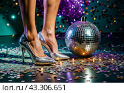 Women's legs in luxurious shiny pumps with heels at a party or disco on the background of a silver mirrored disco ball. The queen of the dance floor. Стоковое AI-изображение, AI-художник Photojuli / Фотобанк Лори