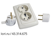 Электрическая розетка и электрические вилки на белом фоне. Electrical plug and electric socket on white background. Стоковое фото, фотограф Татьяна Д / Фотобанк Лори