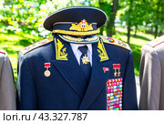 Vintage ceremonial naval uniform of Admiral of the Fleet of the Soviet Union S. Gorshkov with various awards, orders and medals (2024 год). Редакционное фото, фотограф FotograFF / Фотобанк Лори