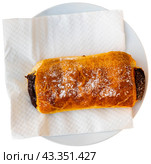 Puff pastry canyeta served with cup of robust espresso. Стоковое фото, фотограф Яков Филимонов / Фотобанк Лори