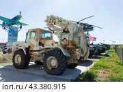 Землеройная машина ПЗМ-2 на колесном тягаче Т-155 Харьковского тракторного завода, для рытья траншей и укрытий для солдат. Каменск-Шахтинский, Ростовская область, Россия (2021 год). Редакционное фото, фотограф Андрей Цыганков / Фотобанк Лори