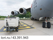 BERLIN - JUNE 05, 2024: The strategic and tactical airlifter McDonnell Douglas/Boeing C-17 Globemaster III. US Air Force. ILA Berlin Air Show 2024. Редакционное фото, фотограф Sergey Kohl / Фотобанк Лори