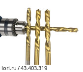 Патрон дрели и сверла на белом фоне. Cordless drill with twist bit closeup isolated on white. Стоковое фото, фотограф Татьяна Д / Фотобанк Лори