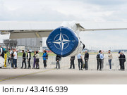 BERLIN - JUNE 05, 2024: NATO emblem on an aircraft engine cover. ILA Berlin Air Show 2024. Редакционное фото, фотограф Sergey Kohl / Фотобанк Лори