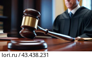 A court session within the framework of law and justice: attention to the hammer. Стоковое AI-изображение, AI-художник Zakharova Natasha / Фотобанк Лори