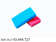 Two red and blue sponges for washing dishes on a white background are isolated. Стоковое фото, фотограф Ярославский Максим / Фотобанк Лори