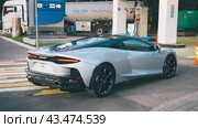 Luxurious super car McLaren GT on city street. Редакционное фото, фотограф Константин Григорьев / Фотобанк Лори