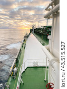 Board of lng tanker sailing in ocean. Types of tankship include oil tanker, chemical tanker, gas carrier. Стоковое фото, фотограф Ирина Старикова / Фотобанк Лори