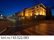 Evening city. Rultytegin street and hotel building in the city of Anadyr. Anadyr is the administrative center of Chukotka and the easternmost city of Russia. Travel and tourism in the Russian Arctic. (2008 год). Стоковое фото, фотограф Андрей Степанов / Фотобанк Лори