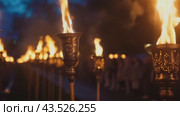 Burning torches in the column. Стоковое AI-видео, аниматор Юрий Поздников / Фотобанк Лори