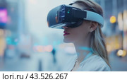A woman with black hair is seen on a city street, wearing a virtual reality headset. Стоковое AI-видео, аниматор Юрий Поздников / Фотобанк Лори