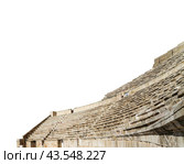 Roman Theatre in Amman, Jordan -- theatre was built the reign of Antonius Pius (138-161 CE), the large and steeply raked structure could seat about 6000 people. Carved, on white background (2014 год). Стоковое фото, фотограф Владимир Журавлев / Фотобанк Лори