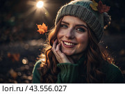 Autumn portrait. Close-up of a red-haired young woman with expressive green eyes in a knitted hat and sweater. The girl laughs in the rays of the setting autumn sun. Стоковое AI-изображение, AI-художник Photojuli / Фотобанк Лори