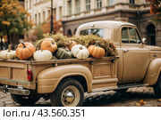 Autumn, autumn design. A large harvest of pumpkins on the back seat of a retro pickup truck, close-up. Стоковое AI-изображение, AI-художник Photojuli / Фотобанк Лори