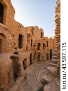 Uninhabited fortified village with houses and granaries, Tunisia. Ksar of Mgabla, Berber, Tataouine. Стоковое фото, фотограф Яков Филимонов / Фотобанк Лори