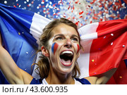 A beautiful athlete or cheerleader from France with joyful shouts after winning the competition at the Olympic Games against the background of the French flag. Стоковое AI-изображение, AI-художник Photojuli / Фотобанк Лори