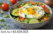 Savor a nutritious bowl of crispy vegetables complemented by a flawlessly cooked sunnysideup egg. Стоковое AI-изображение, AI-художник Юрий Поздников / Фотобанк Лори