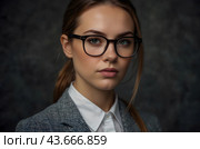 Shortsightedness.A girl in modern glasses. Correction of vision with glasses. Стоковое AI-изображение, AI-художник Александр Поташев / Фотобанк Лори