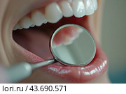 Dentist Holding scaler and month mirror Operation at clinic. Стоковое AI-изображение, AI-художник Ярославский Максим / Фотобанк Лори