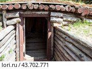 Блиндаж. Комплекс "Партизанская деревня". д. Рабовичи. Славгородский район. Могилевская область. Беларусь (2024 год). Стоковое фото, фотограф Сергей Афанасьев / Фотобанк Лори