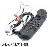 Телефонная трубка с зажимами на белом фоне. Telephone handset with clips on white background. Стоковое фото, фотограф Татьяна Д / Фотобанк Лори