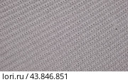 Soft Knitted Woolen Detailed Texture. Natural Fabric Closeup Knit Pattern. Gray Knitwear, Warm Cashmere Surface. Rotation, Macro. Cozy Textile Background. Clothes Production. Melange Yarn. 4K Shot. Стоковое видео, видеограф Марина Демидюк / Фотобанк Лори