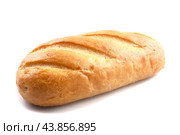 A loaf of fresh wheat bread on a white background. Стоковое фото, фотограф Ярославский Максим / Фотобанк Лори