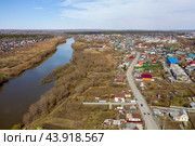 Aerial view of the Inya River and the village of Baryshevo in Russia in spring. Стоковое фото, фотограф Сергей Фролов / Фотобанк Лори