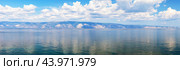 Baikal Lake in summer. Panoramic view of Small Sea strait and Primorskiy mountain range from Olkhon Island. Scenic seascape. Nature background. Panorama, banner. Стоковое фото, фотограф Виктория Катьянова / Фотобанк Лори
