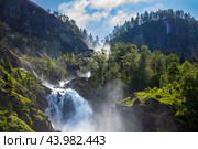 Latefossen Waterfall Odda Norway. Latefoss is a powerful, twin waterfall. Стоковое фото, фотограф Андрей Армягов / Фотобанк Лори