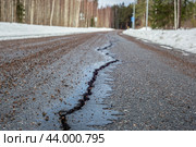 Big crack in asphalt road closeup. Стоковое фото, фотограф Евгений Тарасенко / Фотобанк Лори