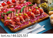 Assortment of sausages fuet, chorizo, jamon. Стоковое фото, фотограф Яков Филимонов / Фотобанк Лори