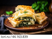 Delectable Spanakopita greek pastry. Generate Ai. Стоковое AI-изображение, AI-художник Иван Рябоконь / Фотобанк Лори