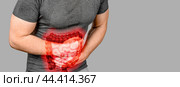 Intestinal inflammation. highlighted intestines. Irritable Bowel Syndrome. Abdominal pain man. Large intestine on man body, stomachache diarrhea symptom or food poisoning. copy space. Стоковое фото, фотограф Павел Муравьев / Фотобанк Лори