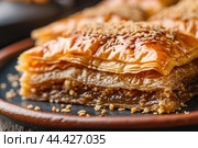 Aromatic Baklava arabian dessert closeup. Generate Ai. Стоковое AI-изображение, AI-художник Иван Рябоконь / Фотобанк Лори