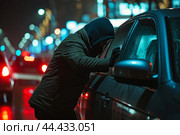 Car theft in progress at night. Стоковое AI-изображение, AI-художник Иван Рябоконь / Фотобанк Лори