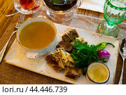 Young bull meat in its own juice with herbs. Khashlama. Стоковое фото, фотограф Яков Филимонов / Фотобанк Лори