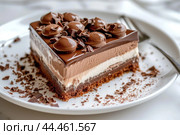 Decadent triple chocolate mousse cake on plate. Стоковое AI-изображение, AI-художник Иван Рябоконь / Фотобанк Лори