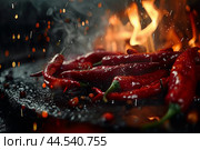 Fiery chili peppers on grill with sparks. Стоковое AI-изображение, AI-художник Иван Рябоконь / Фотобанк Лори