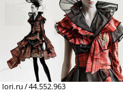 Avantgarde fashion model in red plaid dress. Стоковое AI-изображение, AI-художник Иван Рябоконь / Фотобанк Лори