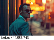 Stylish man in the city at night. Стоковое AI-изображение, AI-художник Иван Рябоконь / Фотобанк Лори