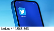 New York, USA - November 30, 2022: Twitter logo icon on cellphone. Twitter is microblogging and social networking service owned by Elon Musk . Registered users can post, like. Стоковое фото, фотограф Павел Муравьев / Фотобанк Лори
