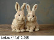 Adorable bunny stuffed animals on wooden surface. Стоковое AI-изображение, AI-художник Иван Рябоконь / Фотобанк Лори
