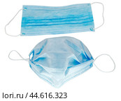 Медицинская маска, закрывающая нос и рот человека. A medical mask that covers a person's nose and mouth. Стоковое фото, фотограф Татьяна Д / Фотобанк Лори